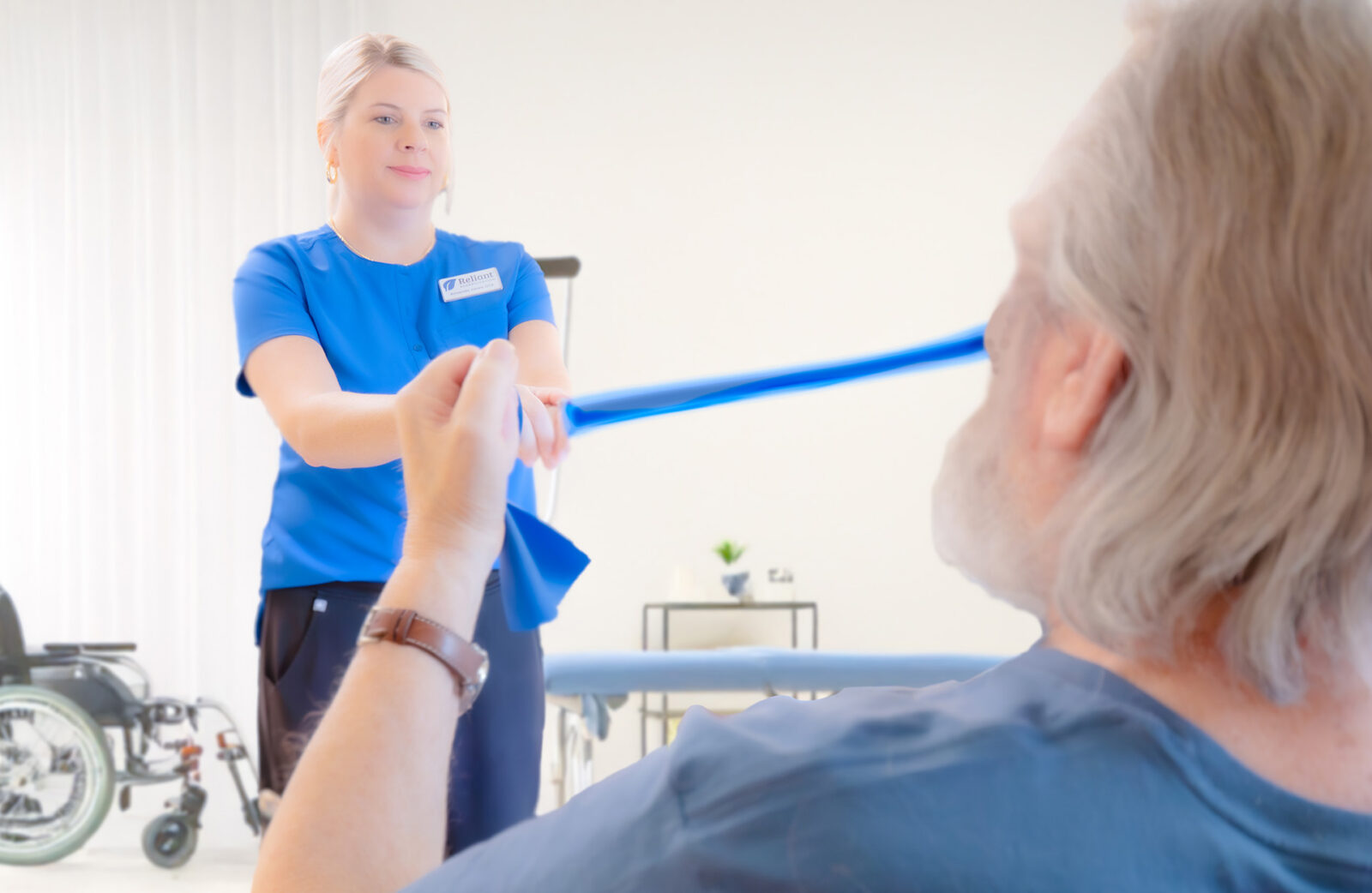 Resident participating in physical therapy as part of Diversicare's rehabilitation services.