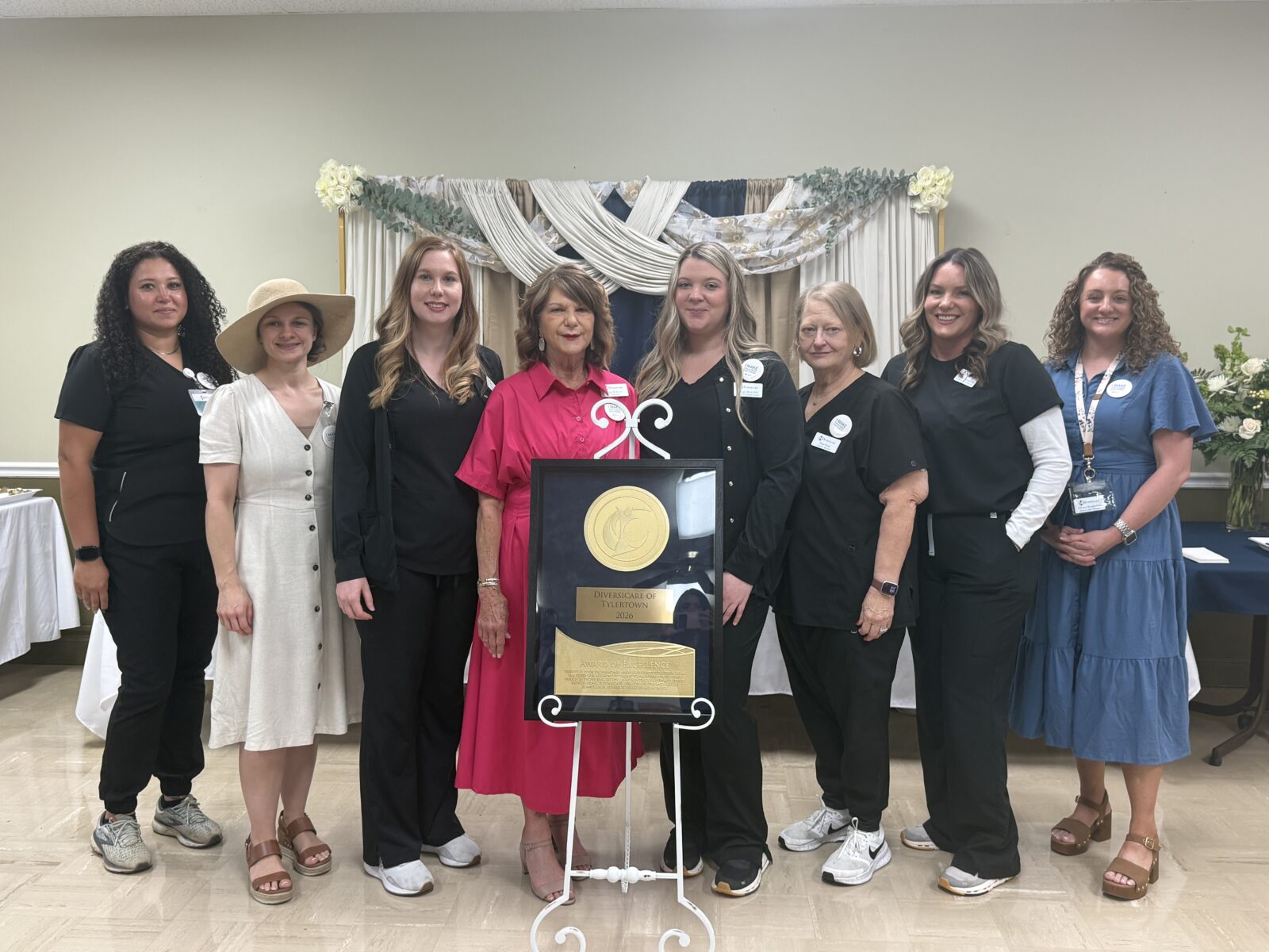 Diversicare of Tylertown team smiling together for a group photo.